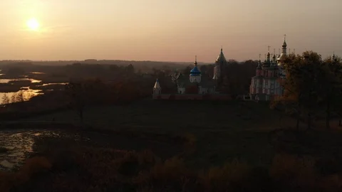 Monastery on the River, Sunset Over the Autumn Marsh, Fog Stock Footage 97997233