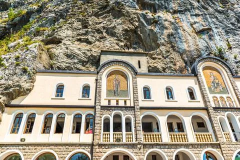 Monastery in rocks Stock Photos