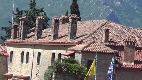 Monastery, roof, chimneys, flags of different countries zoom out Stock-Footage 143066988