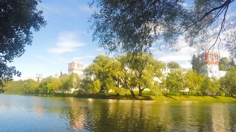 Monastery on shore of a pond timelapse Stock Footage 81605389