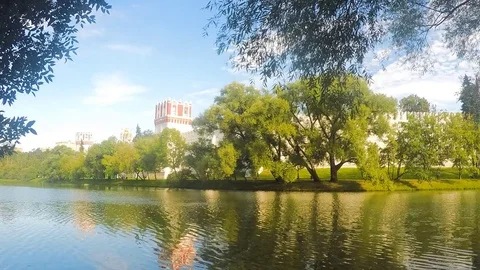 Monastery On Shore Of Pond Timelapse Vidéo 82048472