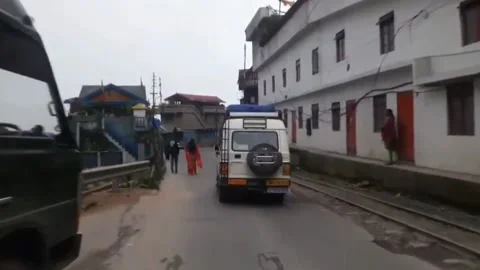 Monastery Toy Train Track and Darjeeling Road Stock Footage 172948662