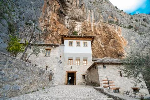 Monastery under a cliff Stock Photos