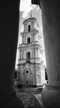 Monastic bell tower framed by columns in black and white Stock Photos