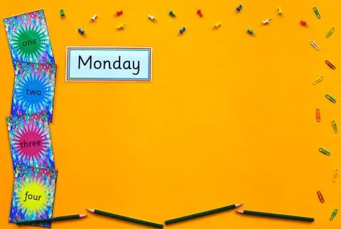 Monday learning flatlay on yellow. Stock Photos