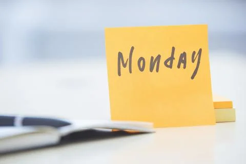 Monday text on adhesive note Stock Photos