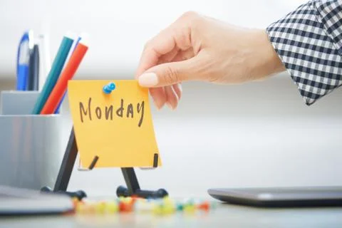 Monday text on adhesive note Stock Photos