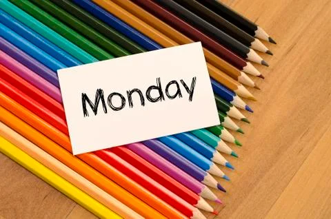 Monday text concept over white note Stock Photos