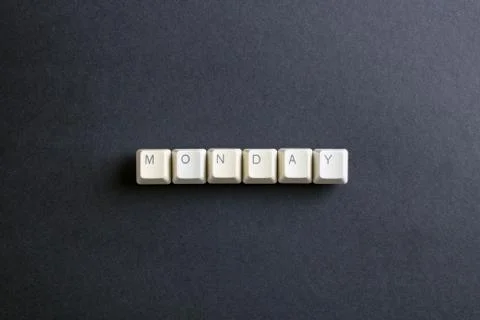 Monday word on computer keys button on a dark background. Foto stock