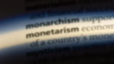 Monetarism word in a dictionary. Stock Footage 99562257