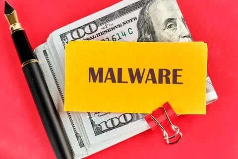 Money is accompanied by a yellow note highlighting the term malware, illustra Stock Photos
