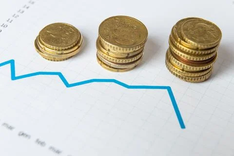 Money and chart Stock Photos