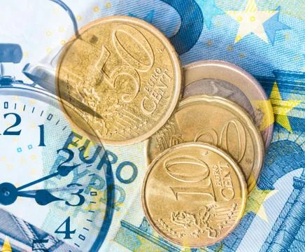 Money and clock Stock Photos
