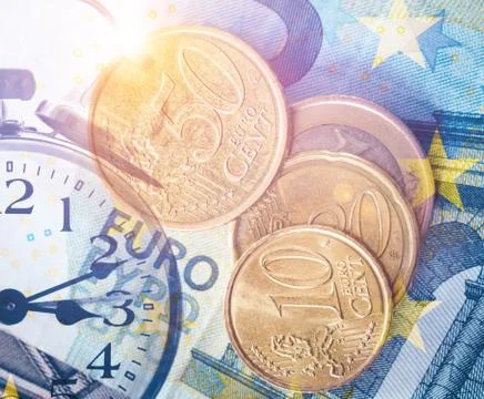 Money and clock Stock Photos