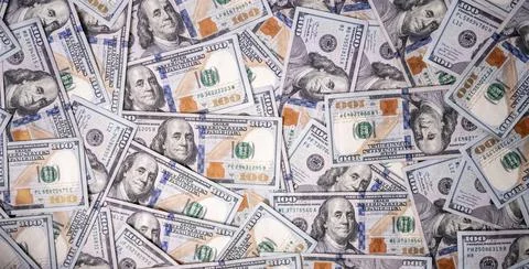 Money background with 100-dollar bills. Texture of US currency. 100 USD Foto stock