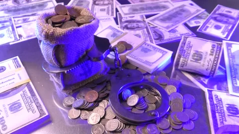 The money bag is handcuffed Stock Footage 138793085