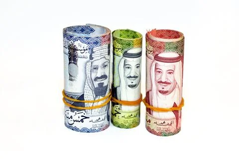 Money banknotes rolls of 500 five hundred Saudi Arabia kingdom riyals bills Stock Photos