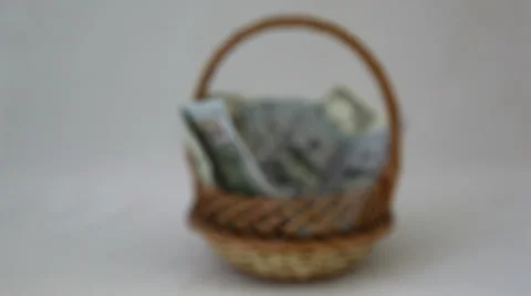 Money in the basket. Stock Footage 45505864