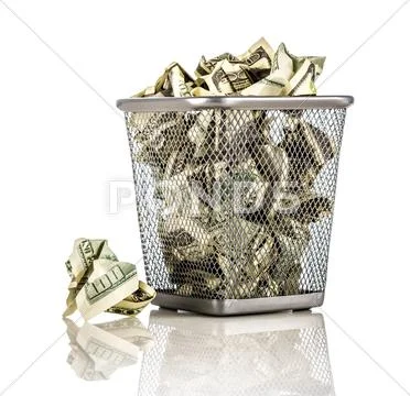Money in a basket Stock Photos