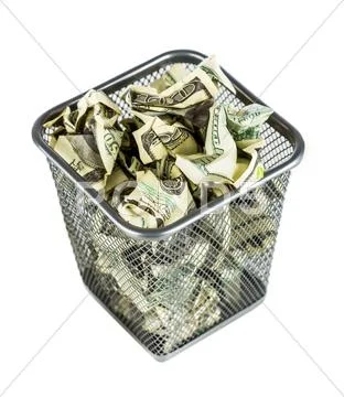 Money in a basket Stock Photos