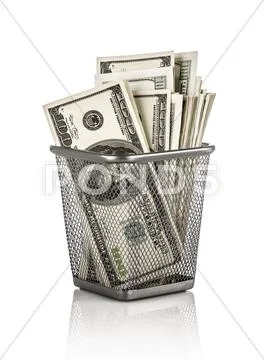 Money in a basket Stock Photos