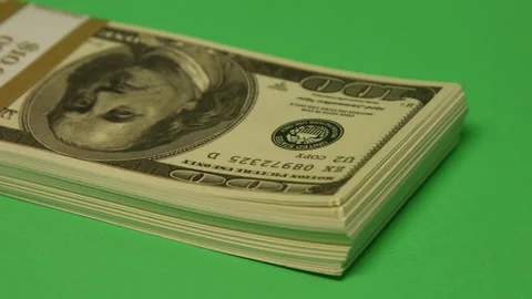 Money cash dollar notes drop into frame pt 2 of 4 Stock Footage 149018799