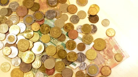 Money Coins And Bills Are Rotated on a Wooden stand Stock Footage 59666186