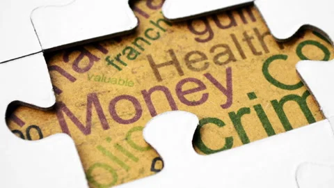 Money Concept Revealed Through Missing Jigsaw Puzzle Piece Stock Footage 340585574