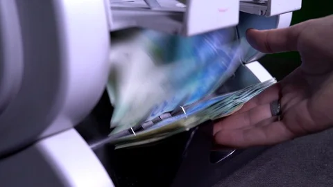 Money counter machine. Female pulls out money. Currency, detector counting Stock Footage 115403079