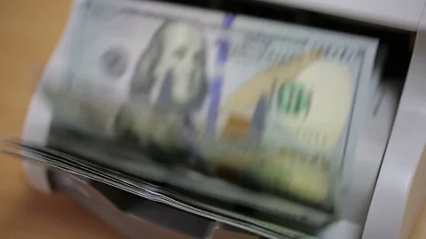Money Counting Machine Counts the US dollars Stock Footage 72340337