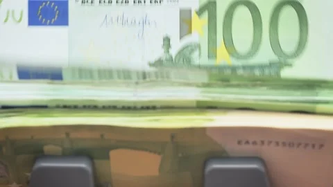 Money counting machine. slow mo movement of one hundred euro banknotes Stock Footage 228071415