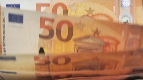 Money counting machine. slow mo movement of 50 euro banknotes Video stock 228784371