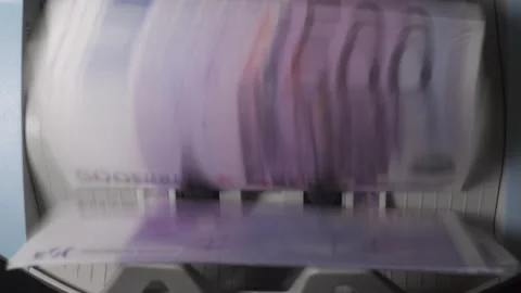 Money currency counting machine counts a pack of 500 EUR. 動画素材 170142553