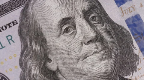 Money dollars the image of Benjamin Franklin close-up camera motion. Video stock 62844507