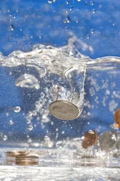 Money Down the Drain Stock Photos