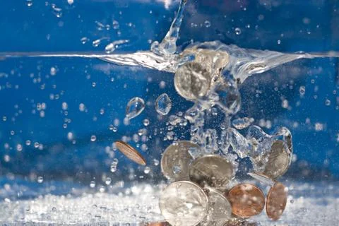 Money Down the Drain Stock Photos