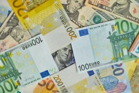 Money. Euro cash and U.S. dollars banknotes. Stock Photos
