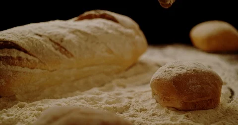 Money falling on bread composition 動画素材 128312962