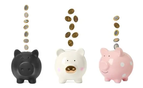 Money falling into different piggy banks on white background Stock Photos