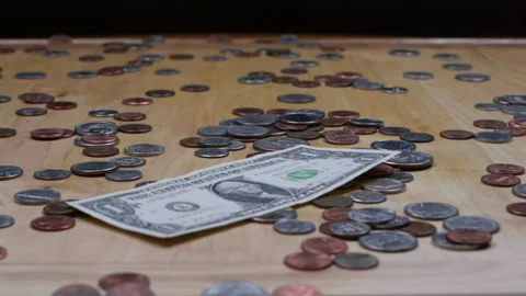 Money falling dropping a $1 dollar bill ... | Stock Video | Pond5