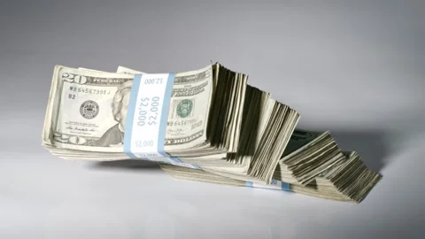 Money Falling On To A Table Vídeo Stock 282831833