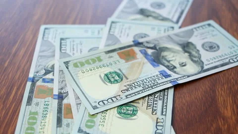 Money gently fall on the table Stock Footage 85964141