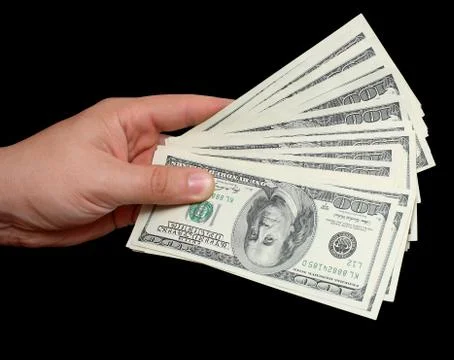 Money in hand Stock Photos