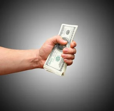 Money in hand Stock Photos