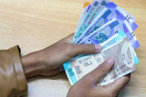Money in the hand Stock Photos