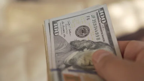 Money - hands counting dollar bills Stock Footage 123733068