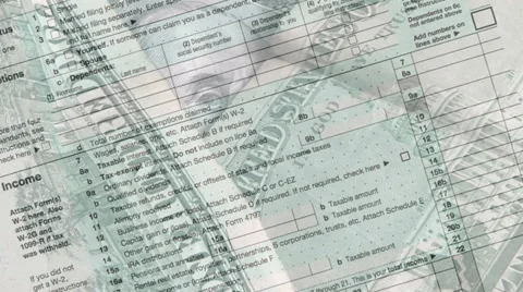Money on income tax form Stock Footage