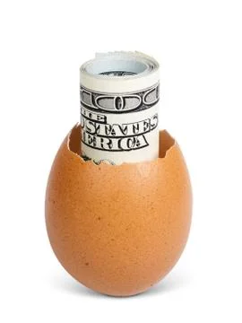 Money inside a broken egg Stock Photos