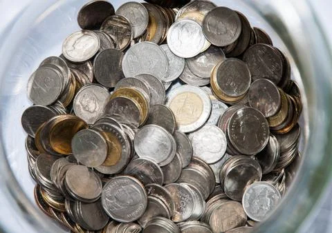 Money in jar Stock Photos