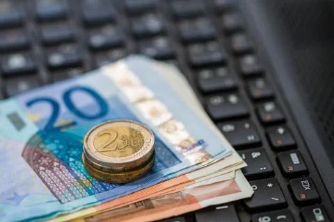 Money on keyboard of computer Stock Photos